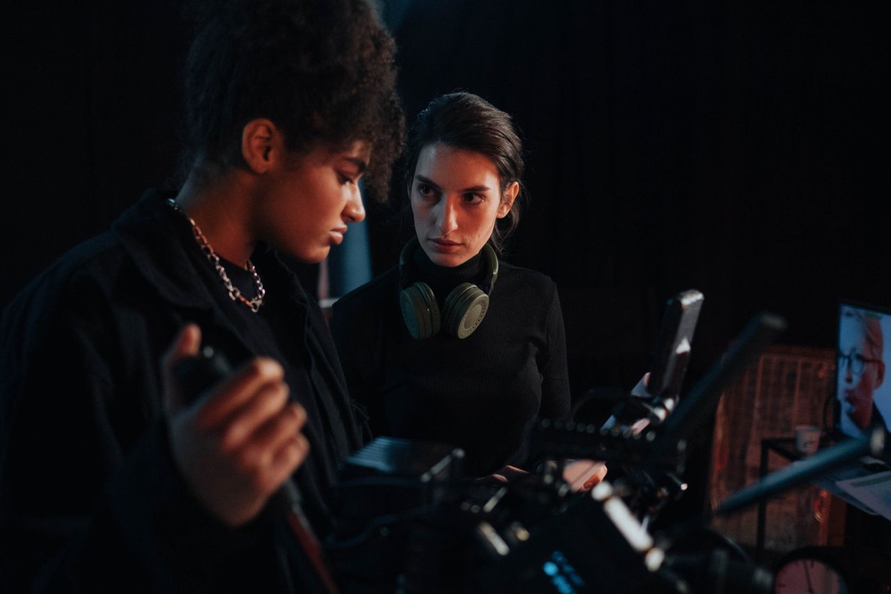 Film crew working on a studio set during a VFX shoot
