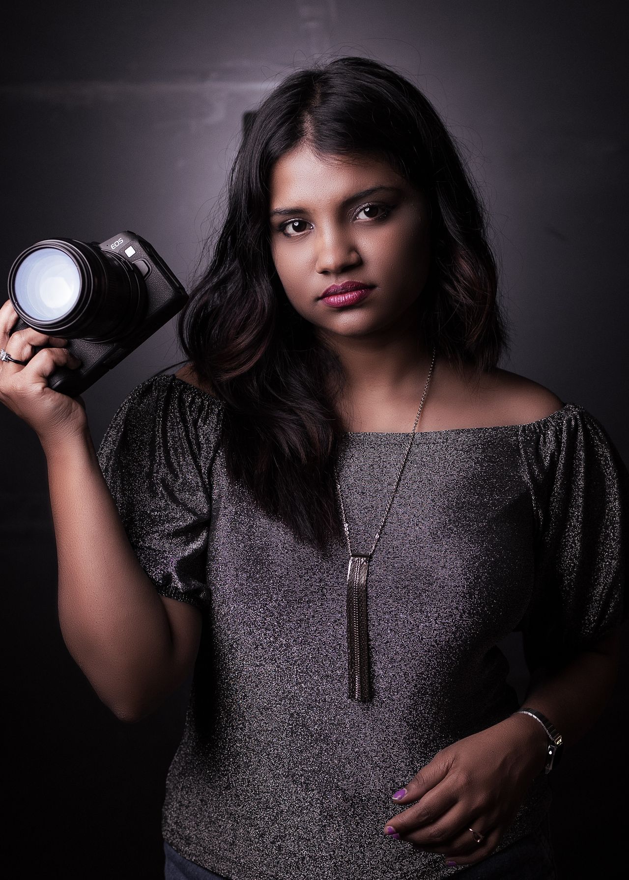 Student filmmaker with a professional camera
