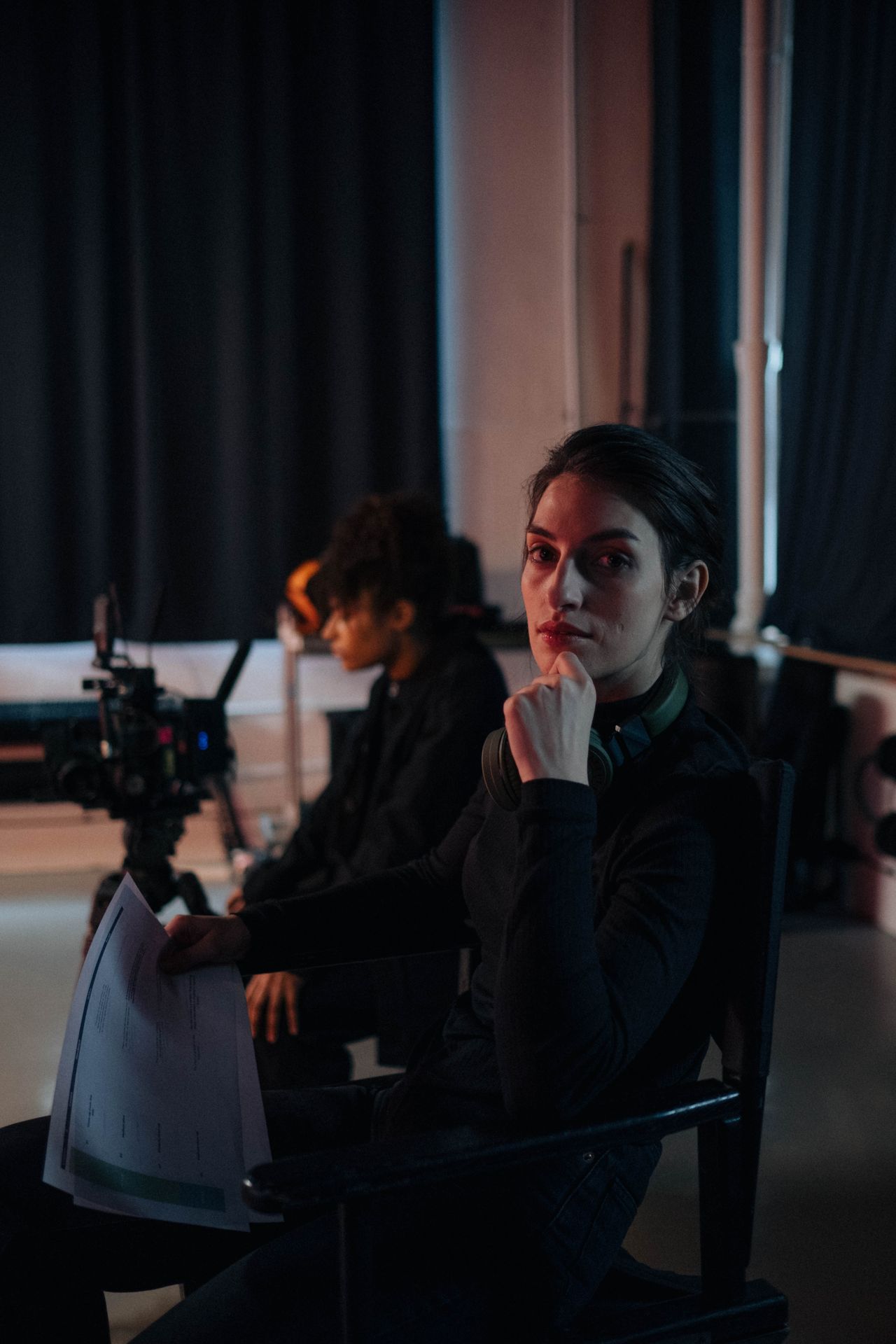 Director guiding students on a film set